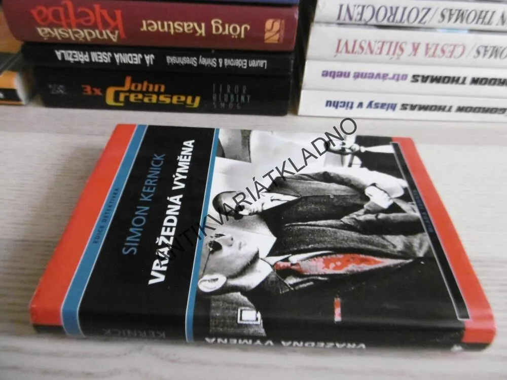 VRAŽEDNÁ VÝMĚNA, SIMON KERNICK, **an