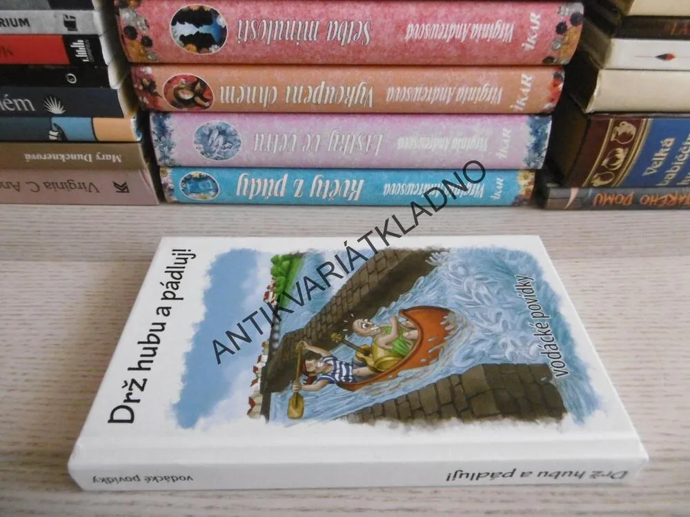 DRŽ HUBU A PÁDLUJ!, **an