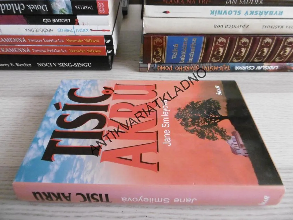 TISÍC AKRŮ, JANE SMILEYOVÁ, **an