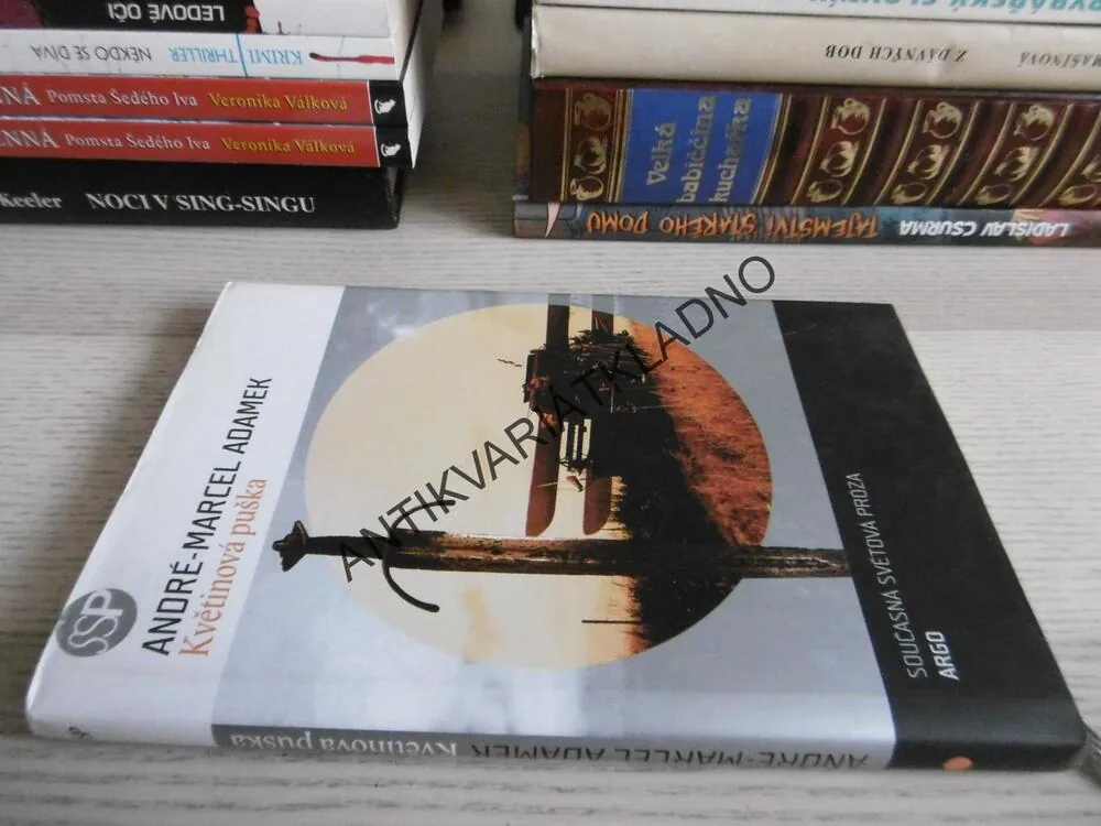 KVĚTINOVÁ PUŠKA, ANDRÉ-MARCEL ADAMEK, **an