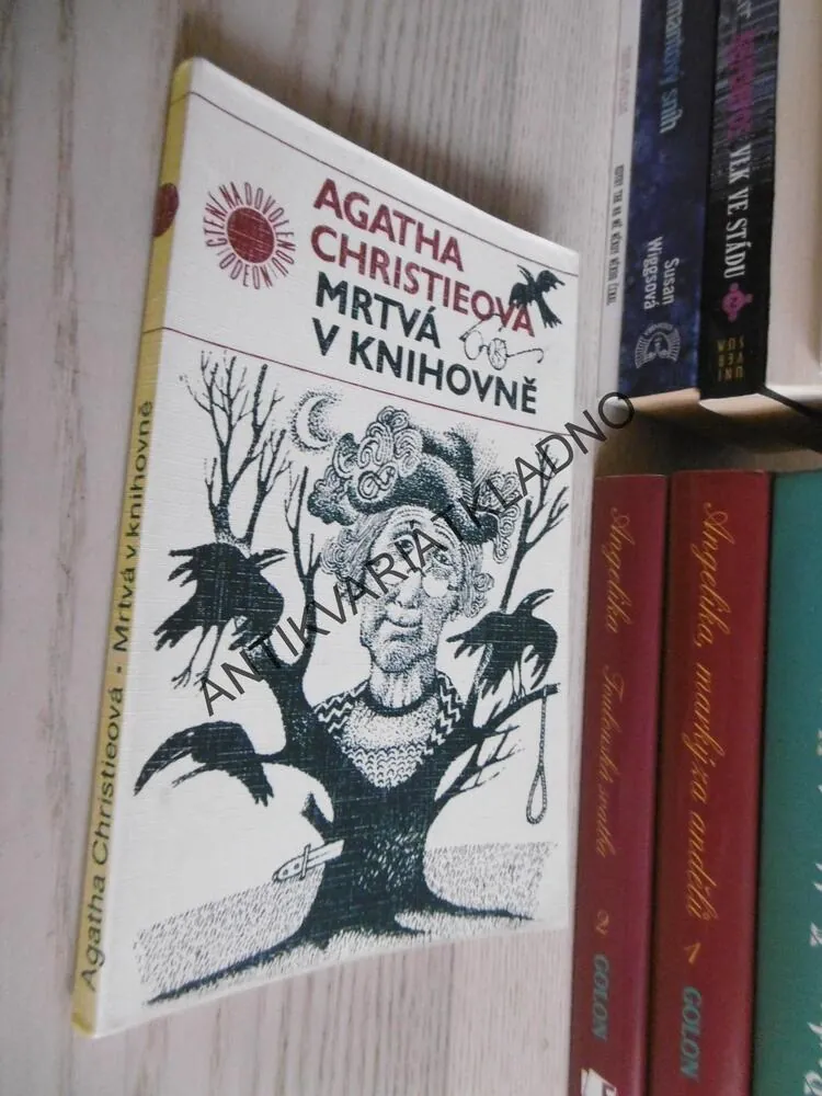 MRTVÁ V KNIHOVNĚ, AGATHA CHRISTIE, **an