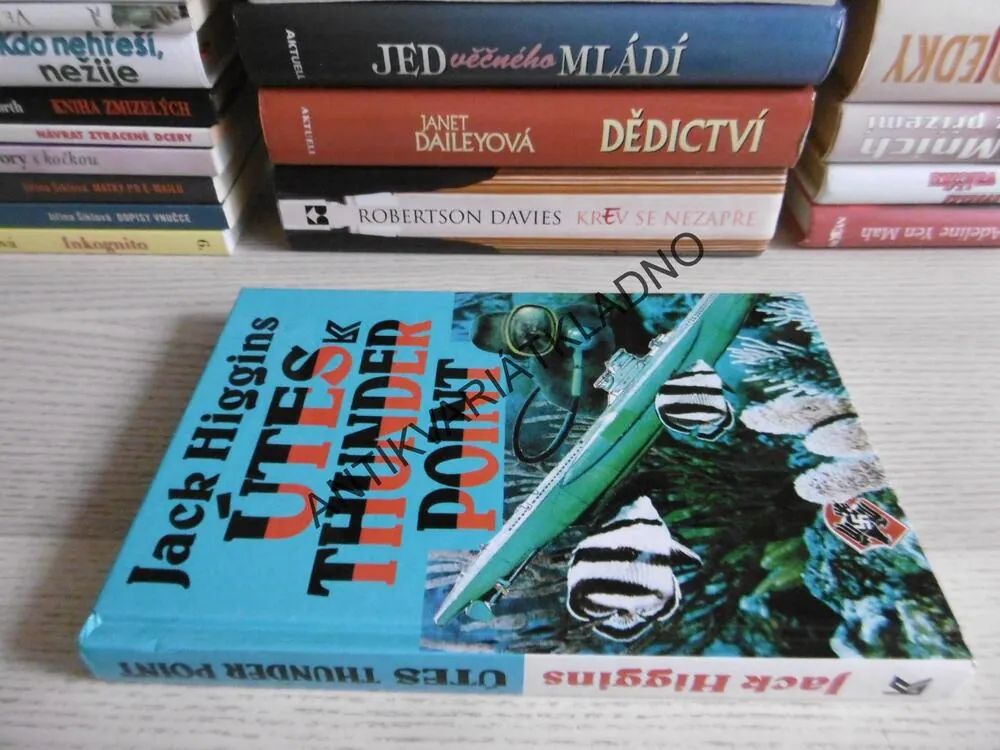 ÚTES THUNDER POINT, JACK HIGGINS, **an