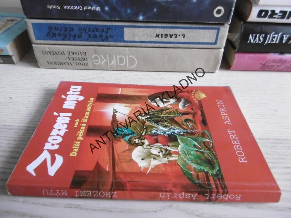 ZROZENÍ MÝTU ANEB DALŠÍ PĚKNÁ ŠLAMASTYKA, ROBERT ASPRIN, **an
