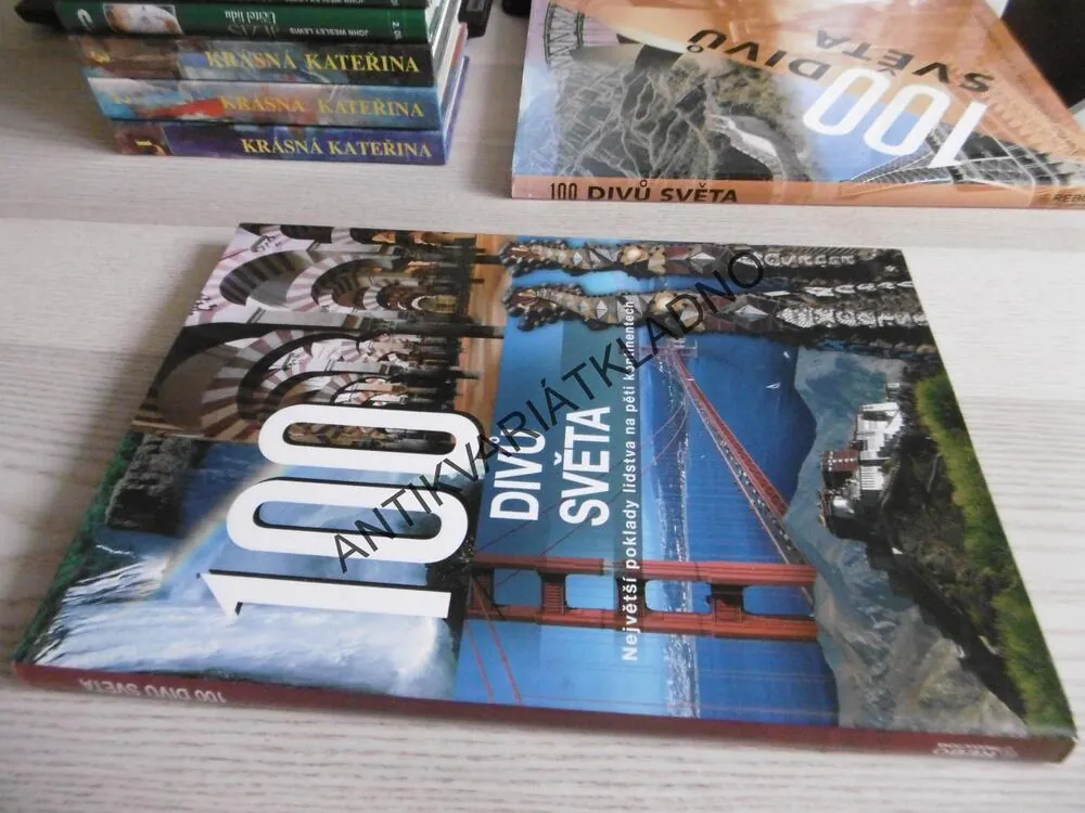 100 DIVŮ SVĚTA, **an