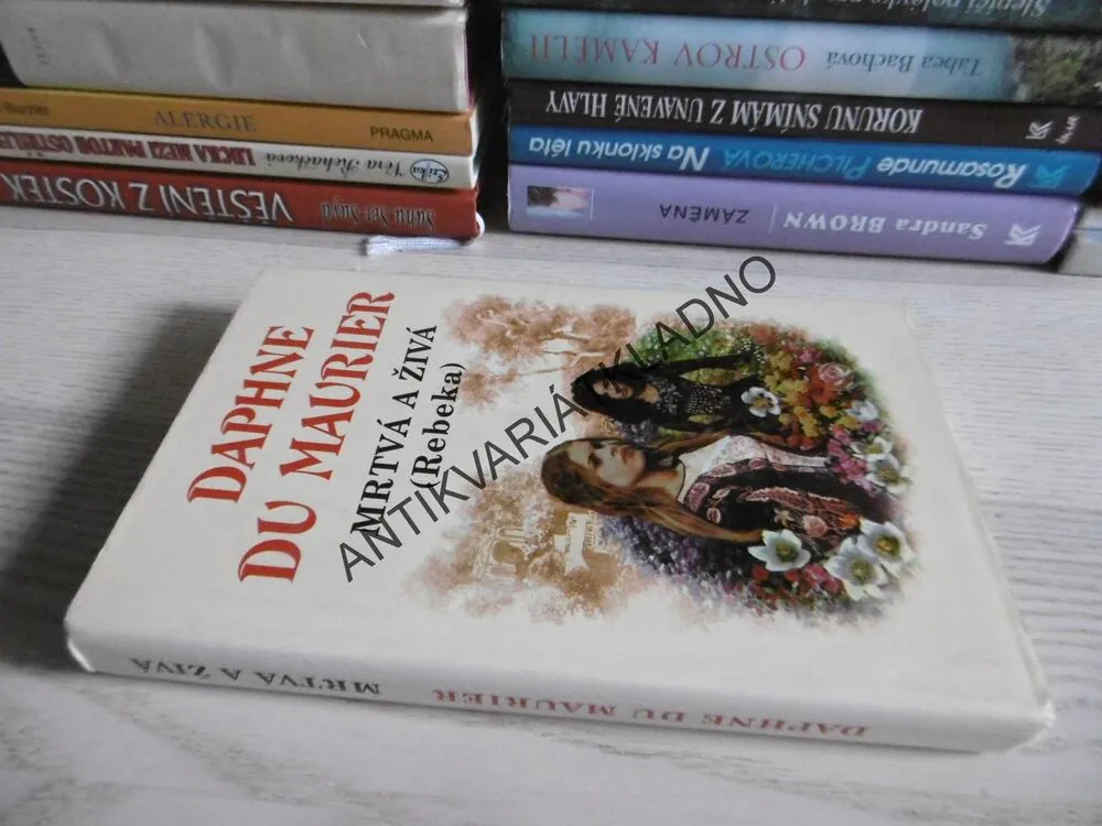 MRTVÁ A ŽIVÁ (REBEKA), DAPHNE DU MAURIER, **an