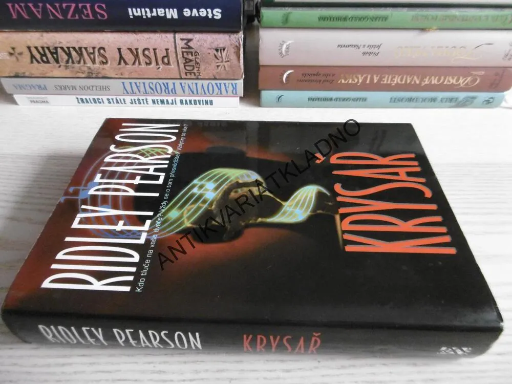 KRYSAŘ, RIDLEY PEARSON, **an