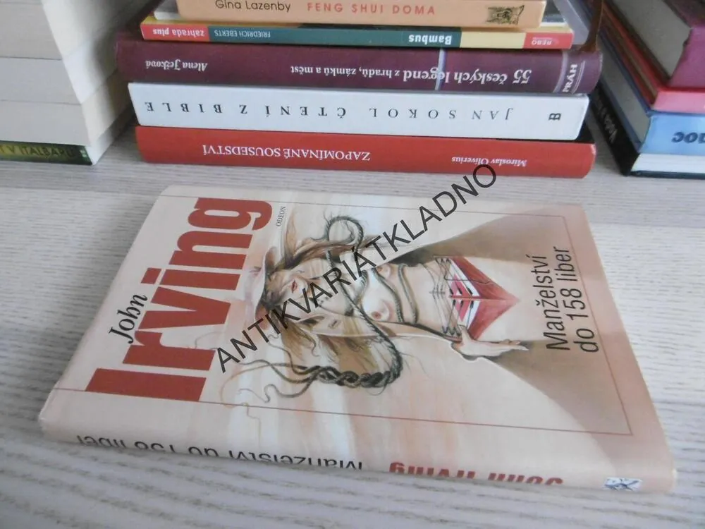 MANŽELSTVÍ DO 158 LIBER, JOHN IRVING, **an