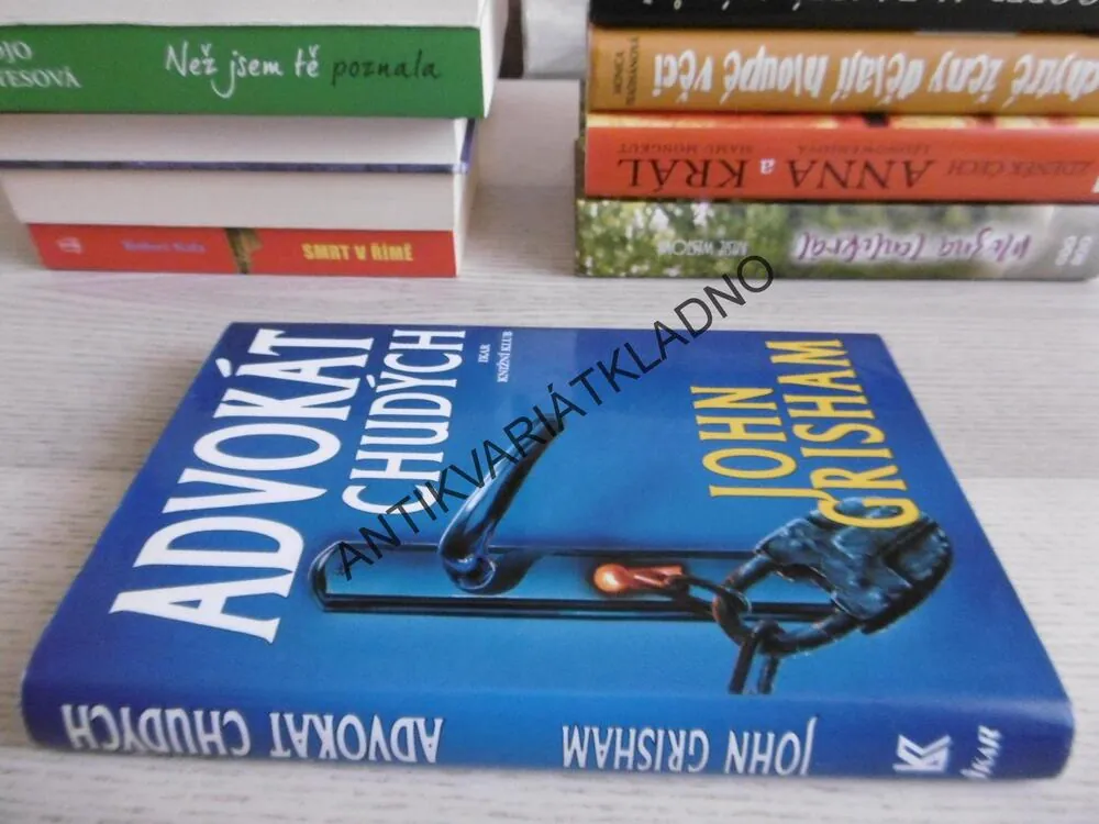 ADVOKÁT CHUDÝCH, JOHN GRISHAM, **an