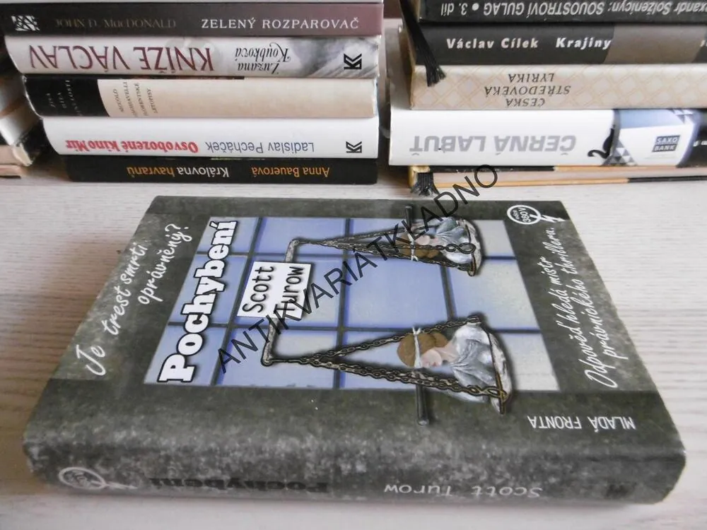 POCHYBENÍ, SCOTT TUROW, **an
