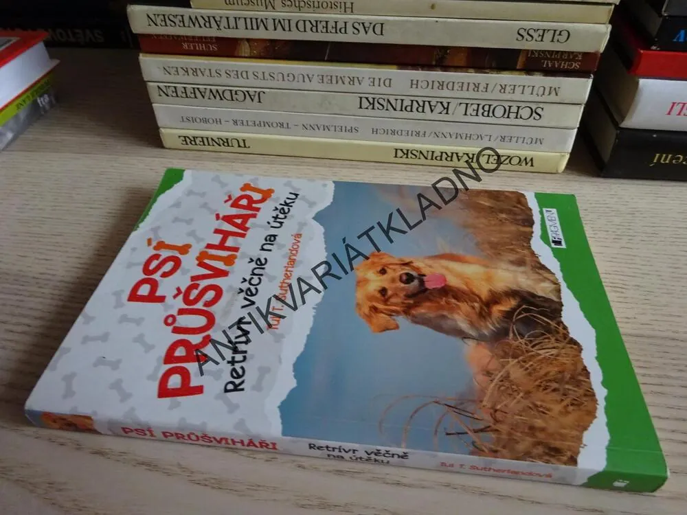 PSÍ PRŮŠVIHÁŘI, RETRÍVR VĚČNĚ NA ÚTĚKU, TUI T. SUTHERLANDOVÁ, **an
