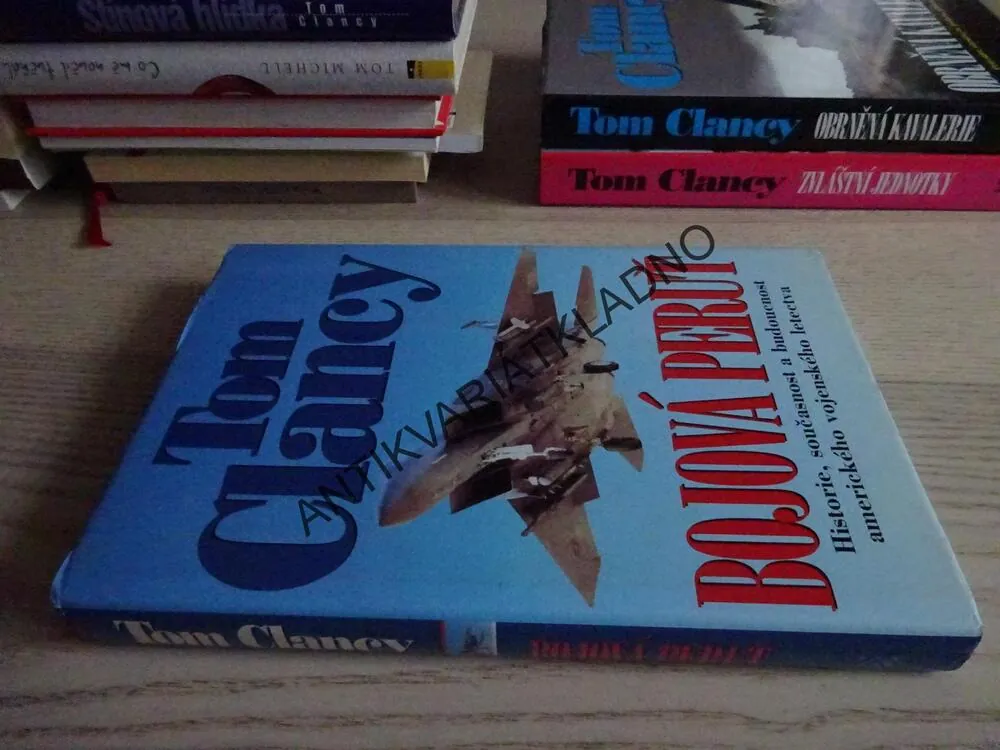 BOJOVÁ PERUŤ, TOM CLANCY, **an