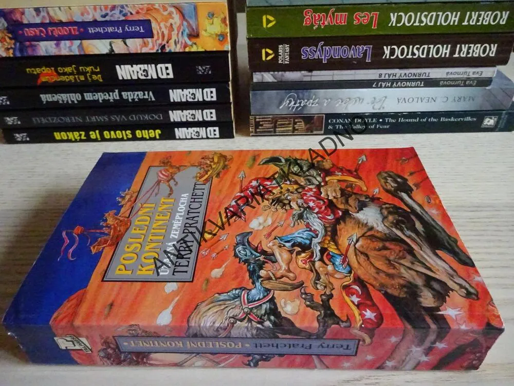POSLEDNÍ KONTINENT, ÚŽASNÁ ZEMĚPLOCHA, TERRY PRATCHETT, **an
