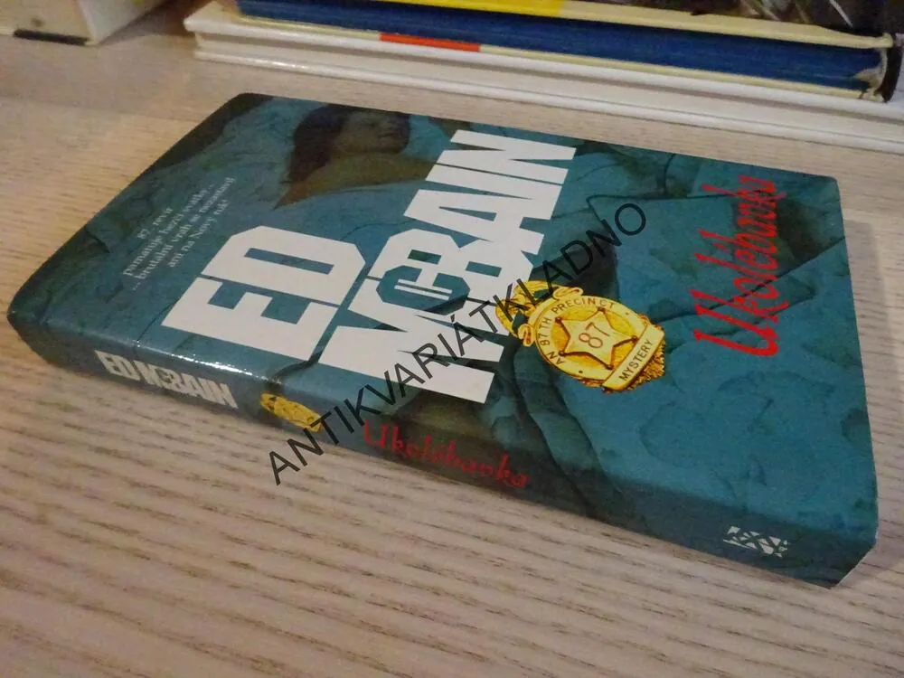 UKOLÉBAVKA, ED MCBAIN, **an