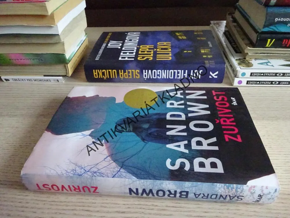 ZUŘIVOST, SANDRA BROWN, **an