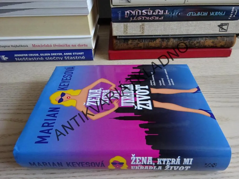 ŽENA, KTERÁ MI UKRADLA ŽIVOT, MARIAN KEYES, **an