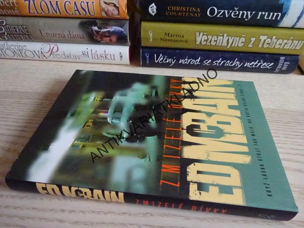 ZMIZELÉ DÍVKY, ED MCBAIN, **an