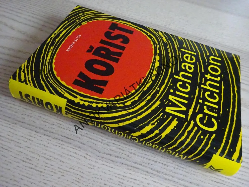 KOŘIST, MICHAEL CRICHTON,  **an
