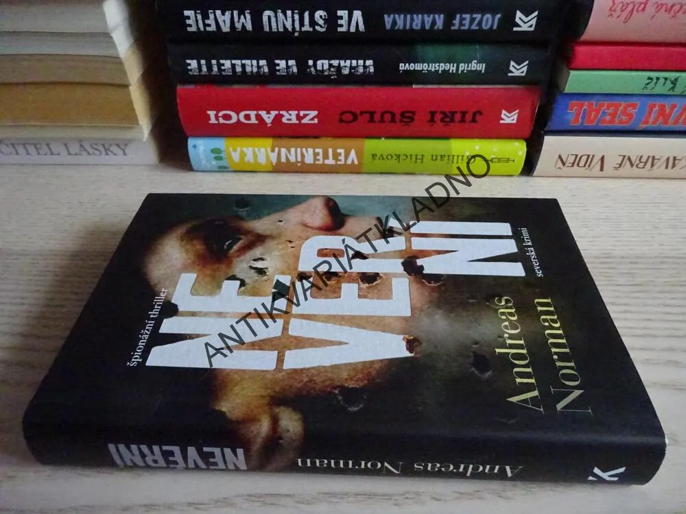 NEVĚRNÍ, ANDREAS NORMAN, **an
