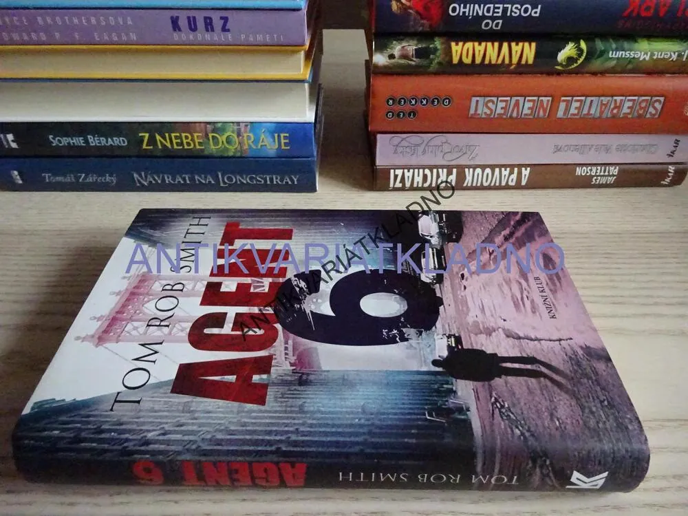 AGENT 6, TOM ROB SMITH, **an
