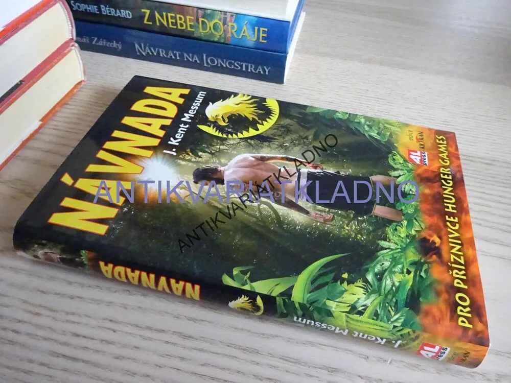 NÁVNADA, J. KENT MESSUM, **an