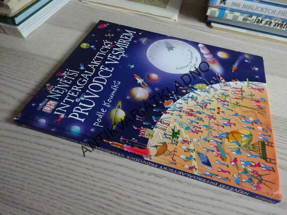 NEJVĚTŠÍ INTERGALAKTICKÝ PRŮVODCE VESMÍREM PODLE KOUMÁKŮ, **an