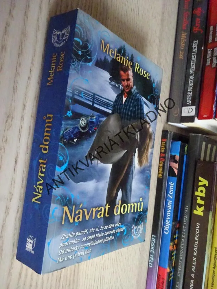 NÁVRAT DOMŮ, MELANIE ROSE, **an