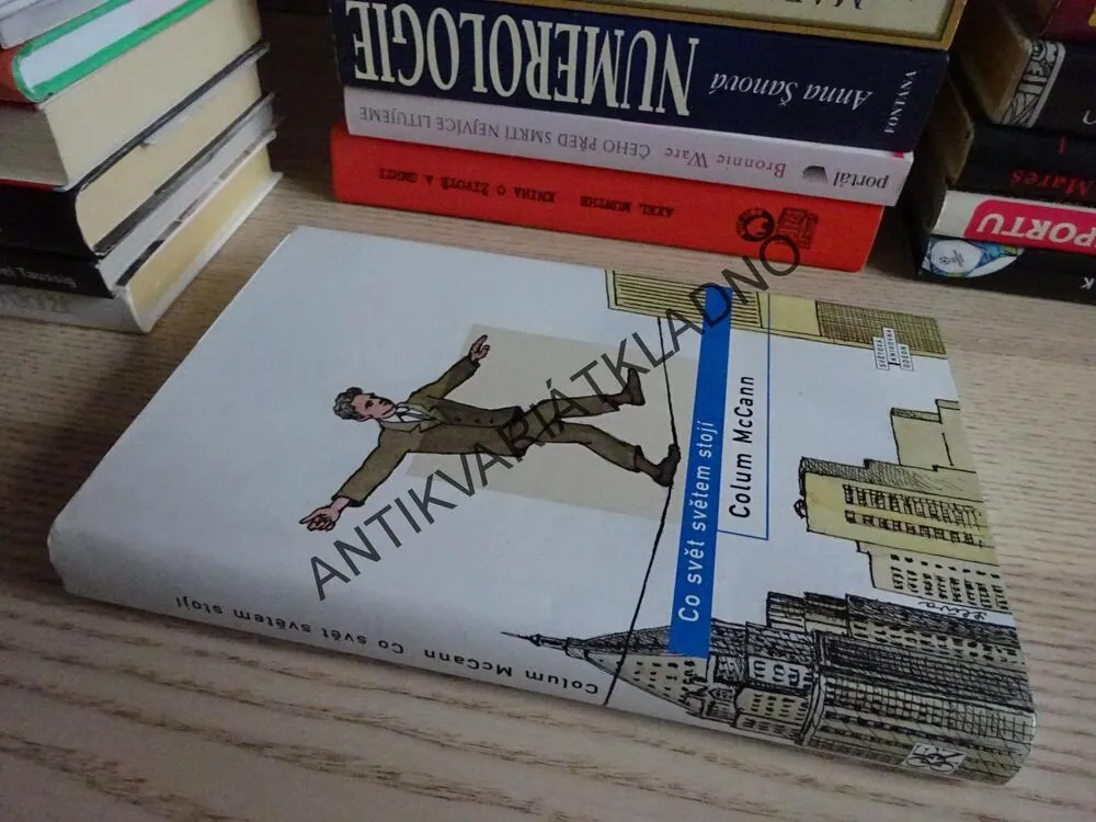 CO SVĚT SVĚTEM STOJÍ, COLUM MCCANN, **an