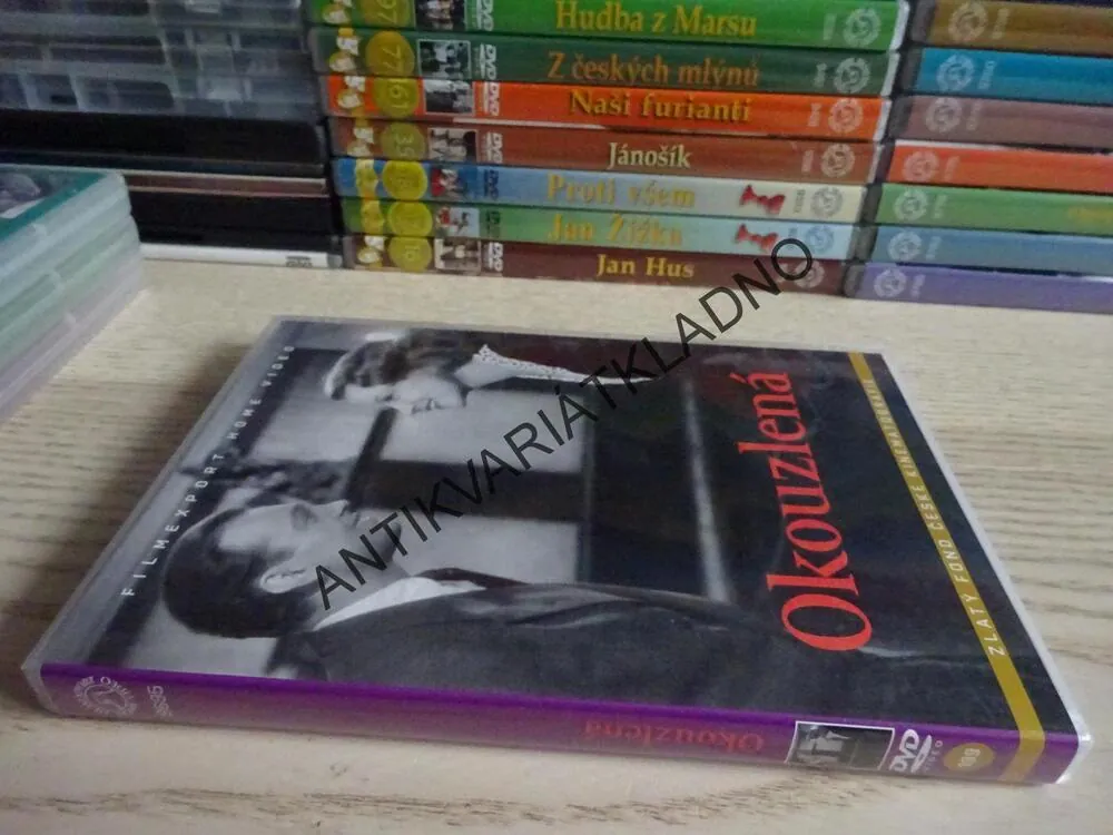OKOUZLENÁ, DVD FILM ČR