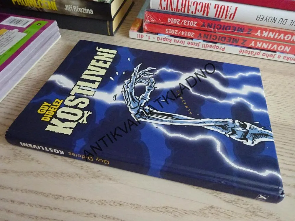KOSTLIVENÍ, GUY DIDELEZ, **an