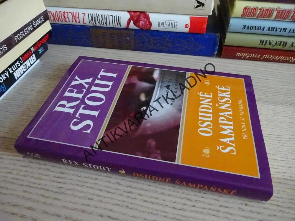 OSUDNÉ ŠAMPAŇSKÉ, REX STOUT, **an