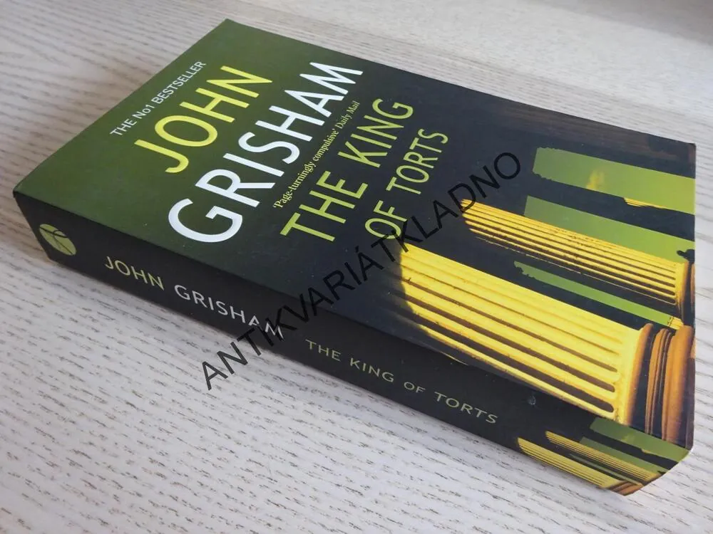 THE KING OF TORTS, JOHN GRISHAM, **an