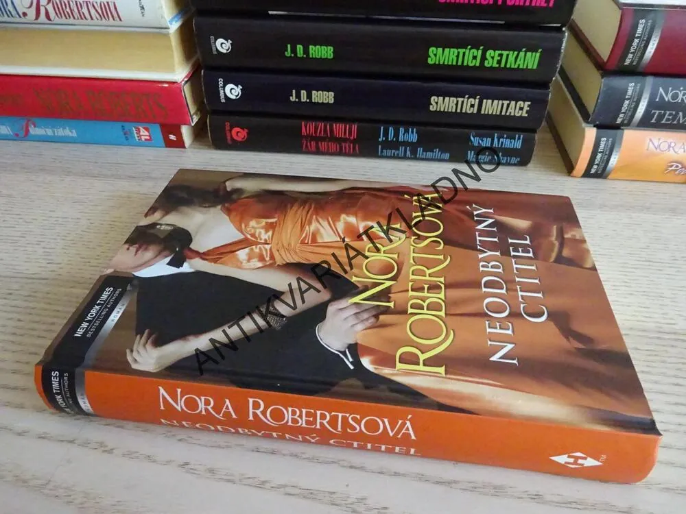 NEODBYTNÝ CTITEL, NORA ROBERTS, **an