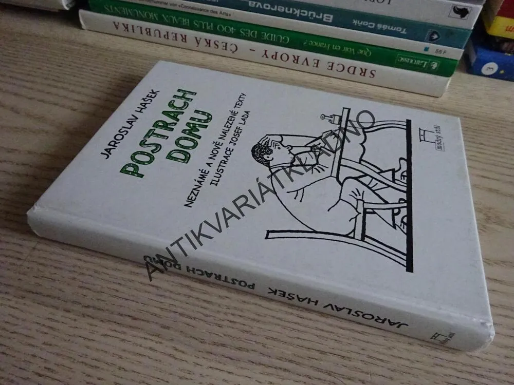 POSTRACH DOMU, JAROSLAV HAŠEK, **an
