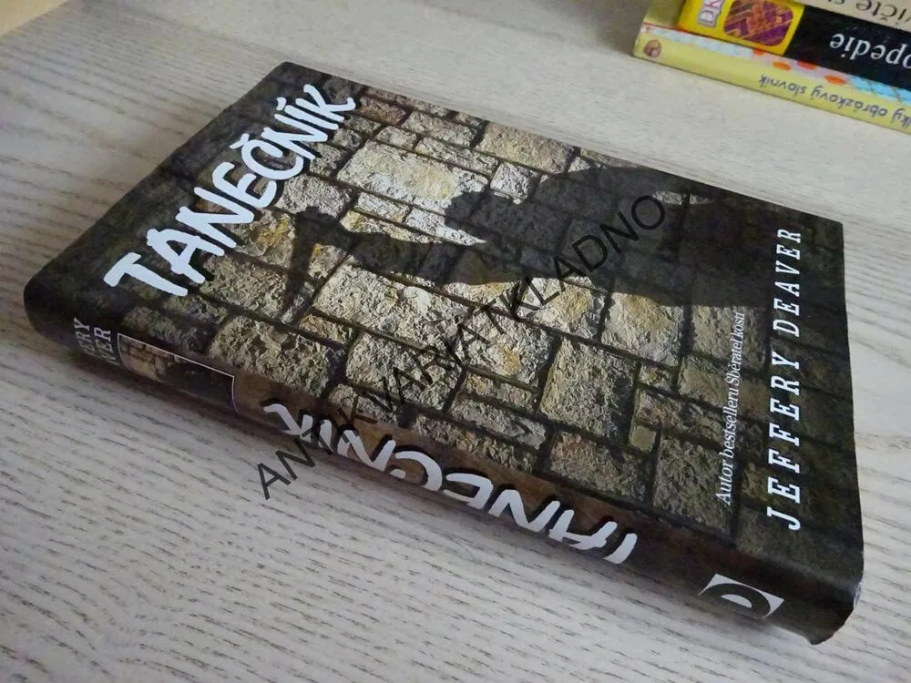 TANEČNÍK, JEFFERY DEAVER, **an