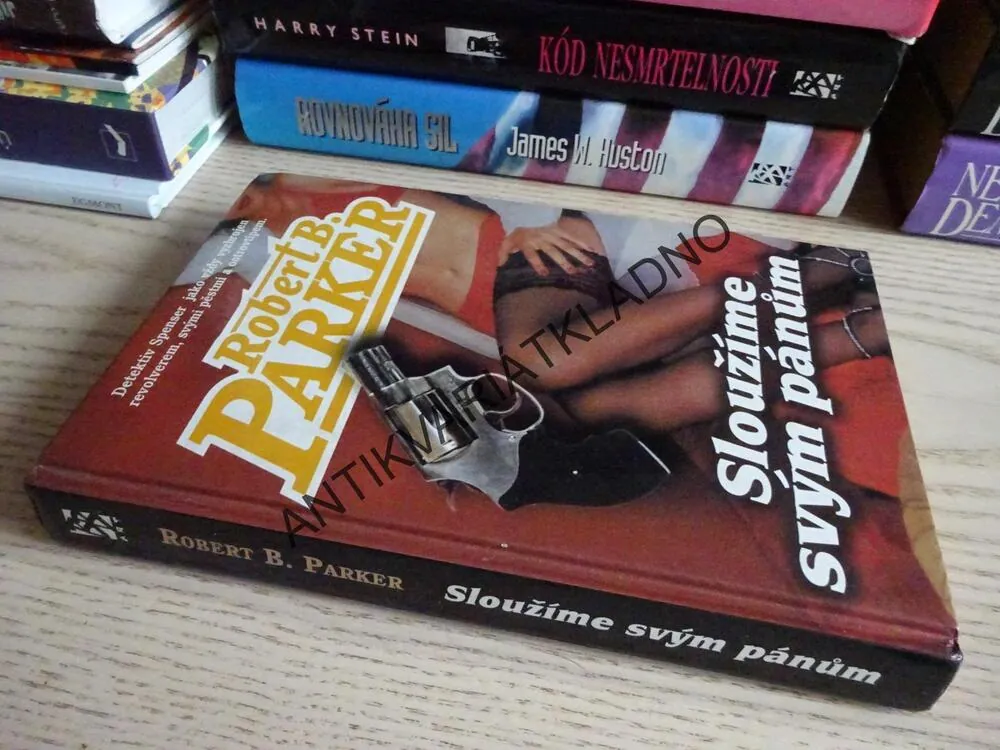 SLOUŽÍME SVÝM PÁNŮM, ROBERT B. PARKER, **an