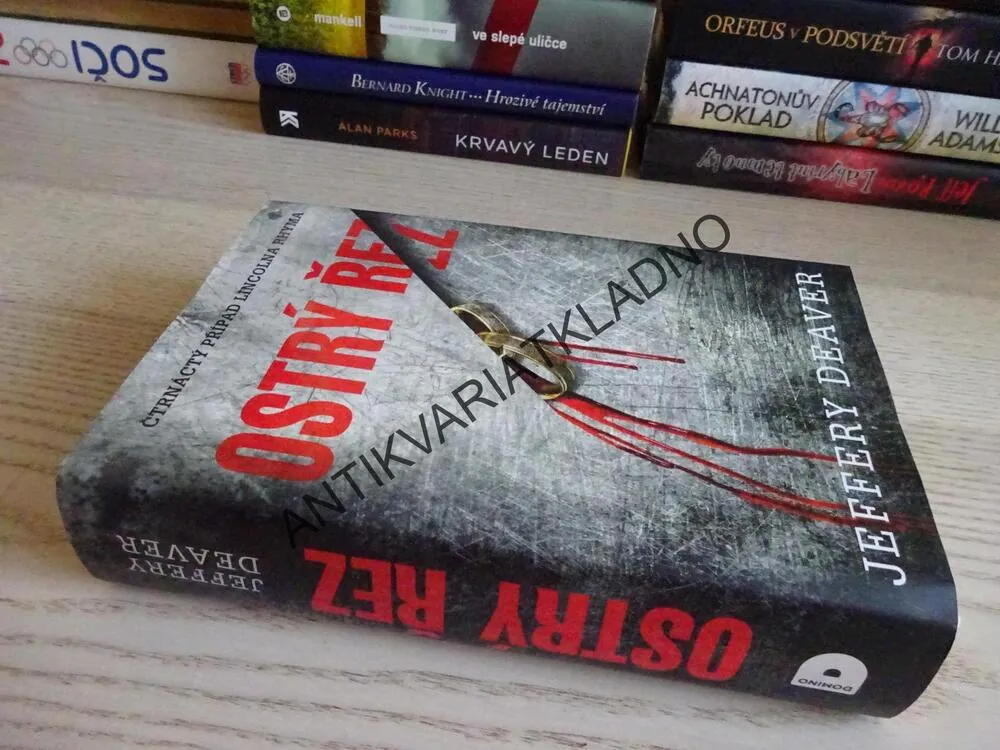 OSTRÝ ŘEZ, JEFFERY DEAVER, **an