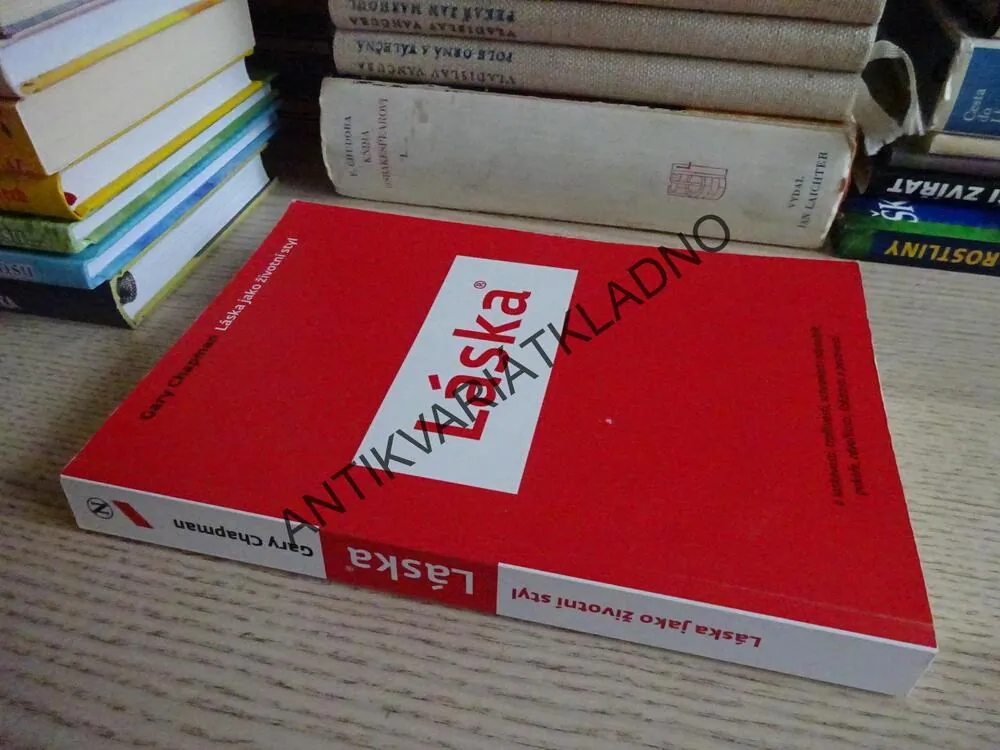LÁSKA, GARY CHAPMAN, **an