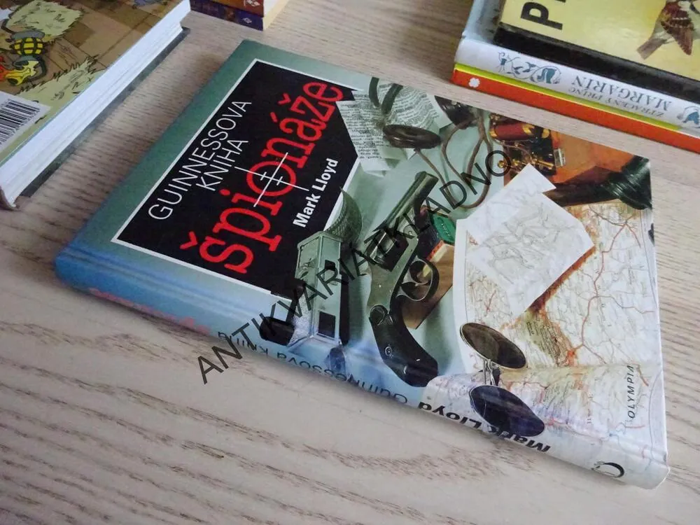 GUINNESSOVA KNIHA ŠPIONÁŽE, MARK LLOYD, **an