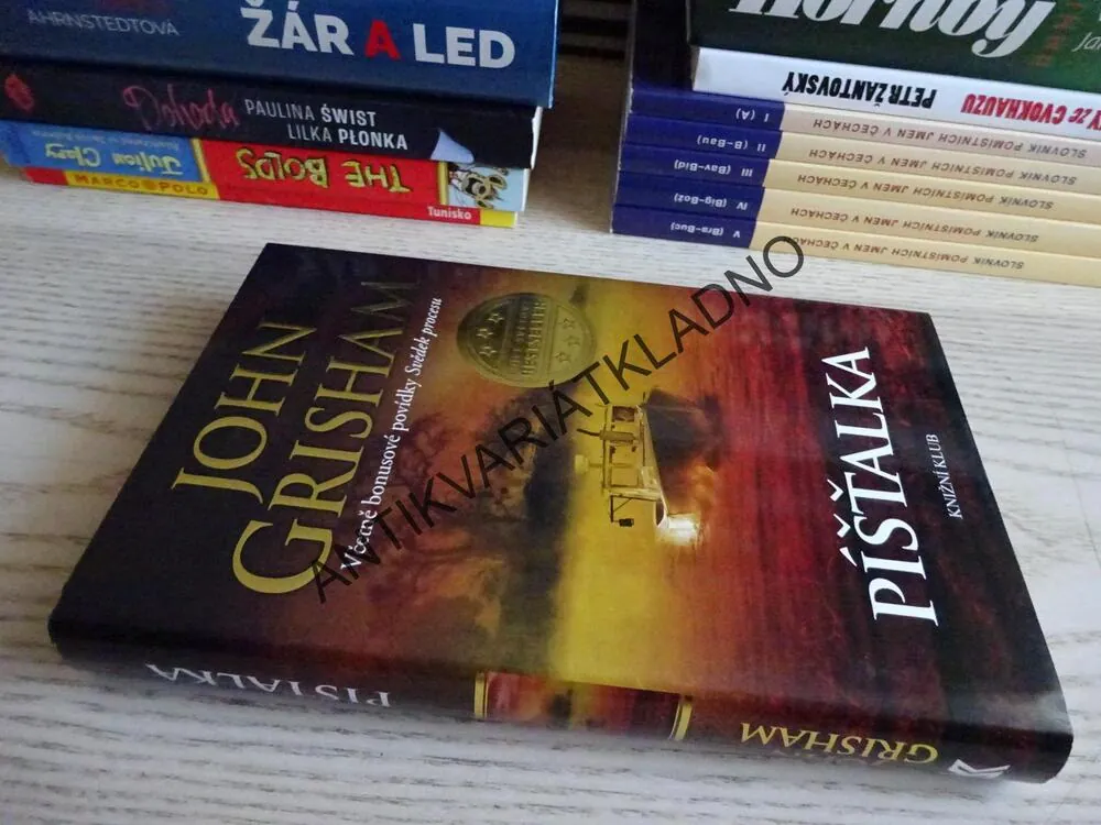 PÍŠŤALKA, JOHN GRISHAM , **an