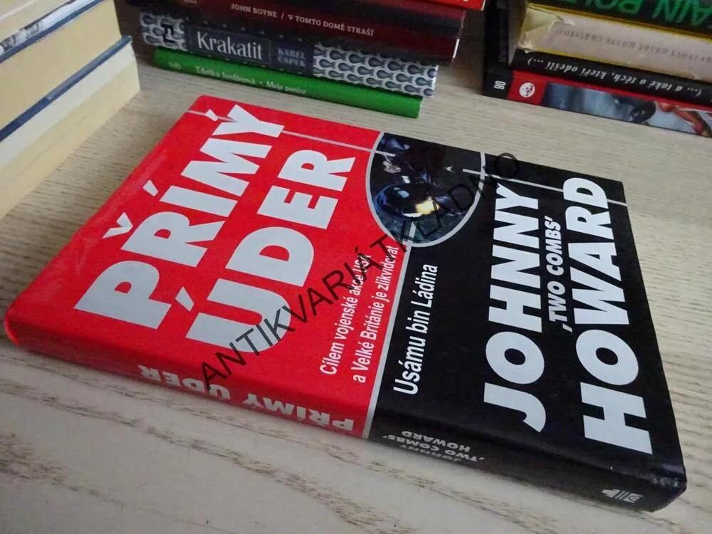 PŘÍMÝ ÚDER, JOHNNY HOWARD, **an