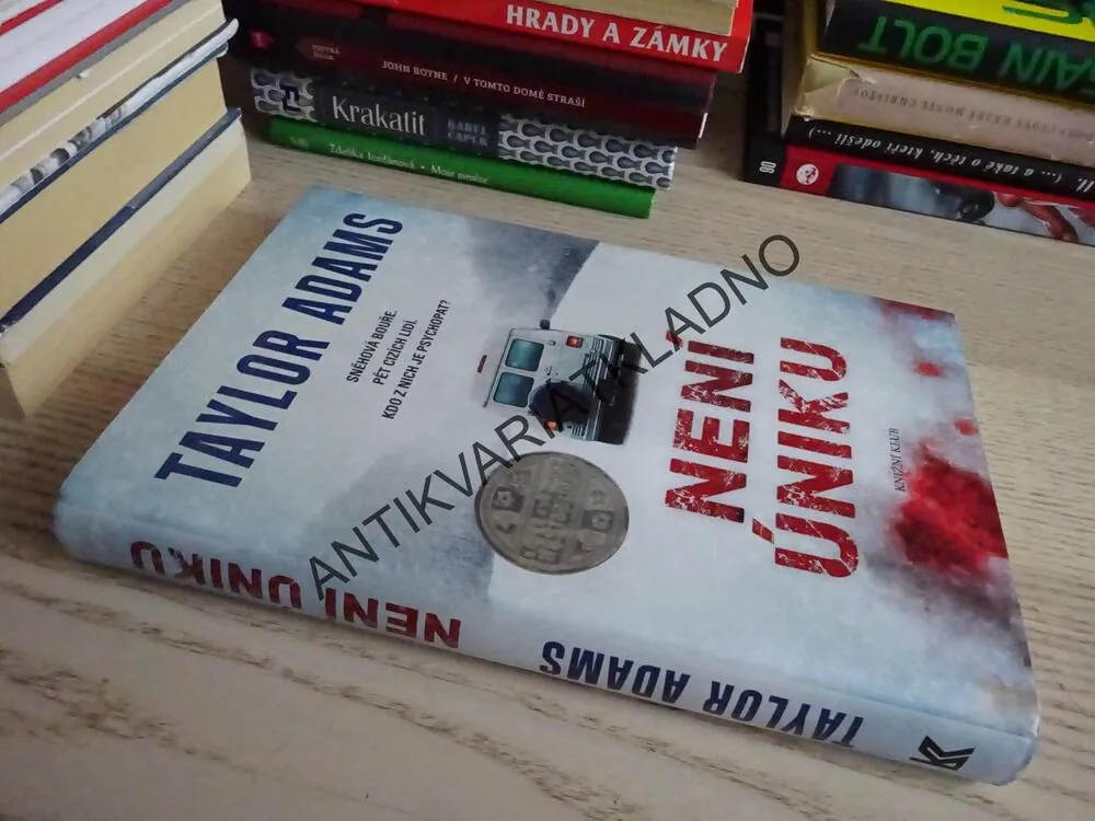 NENÍ ÚNIKU, TAYLOR ADAMS, **an