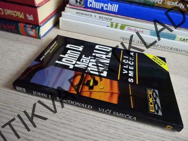 VLČÍ SMEČKA, JOHN D. MACDONALD, **an