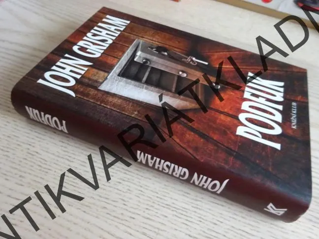 PODFUK, JOHN GRISHAM, **an