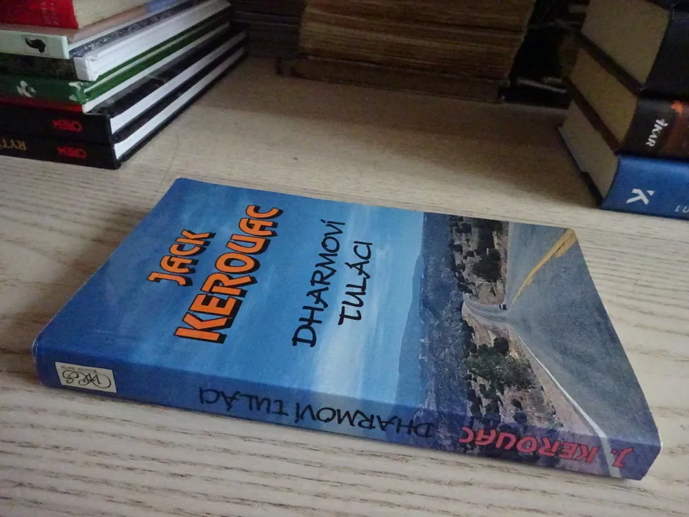 DHARMOVÍ TULÁCI, JACK KEROUAC, **an
