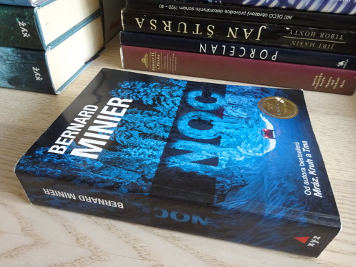 NOC, BERNARD MINIER, **an