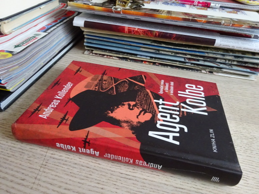 AGENT KOLBE, ANDREAS KOLLENDER, **an