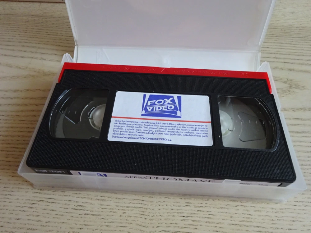 AFÉRA THOMASE CROWNA, P. BROSNAN, RENÉ RUSSO, VHS VIDEOKAZETA