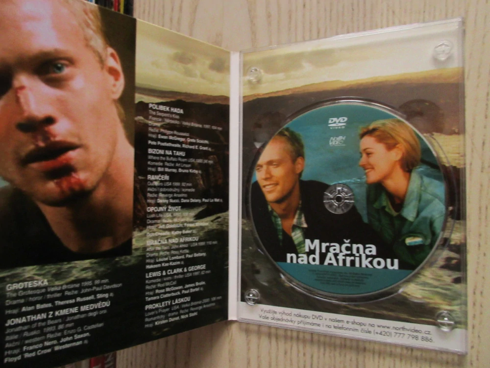 MRAČNA NAD AFRIKOU, L. LOMBARD, P. BETTANY, DVD FILM