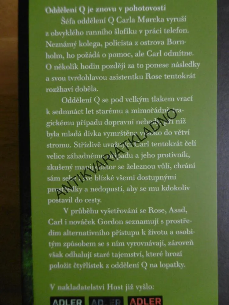 NESMÍRNÝ, ADLER OLSEN, **an