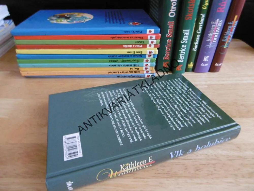 VLK A HOLUBICE, KATHLEEN E. WOODIWISS, **an